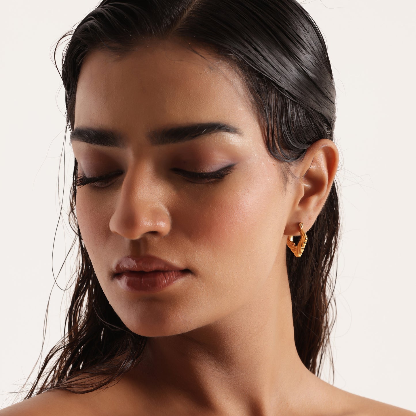 Tira's Gold-Plated Twisted Hoop Earrings