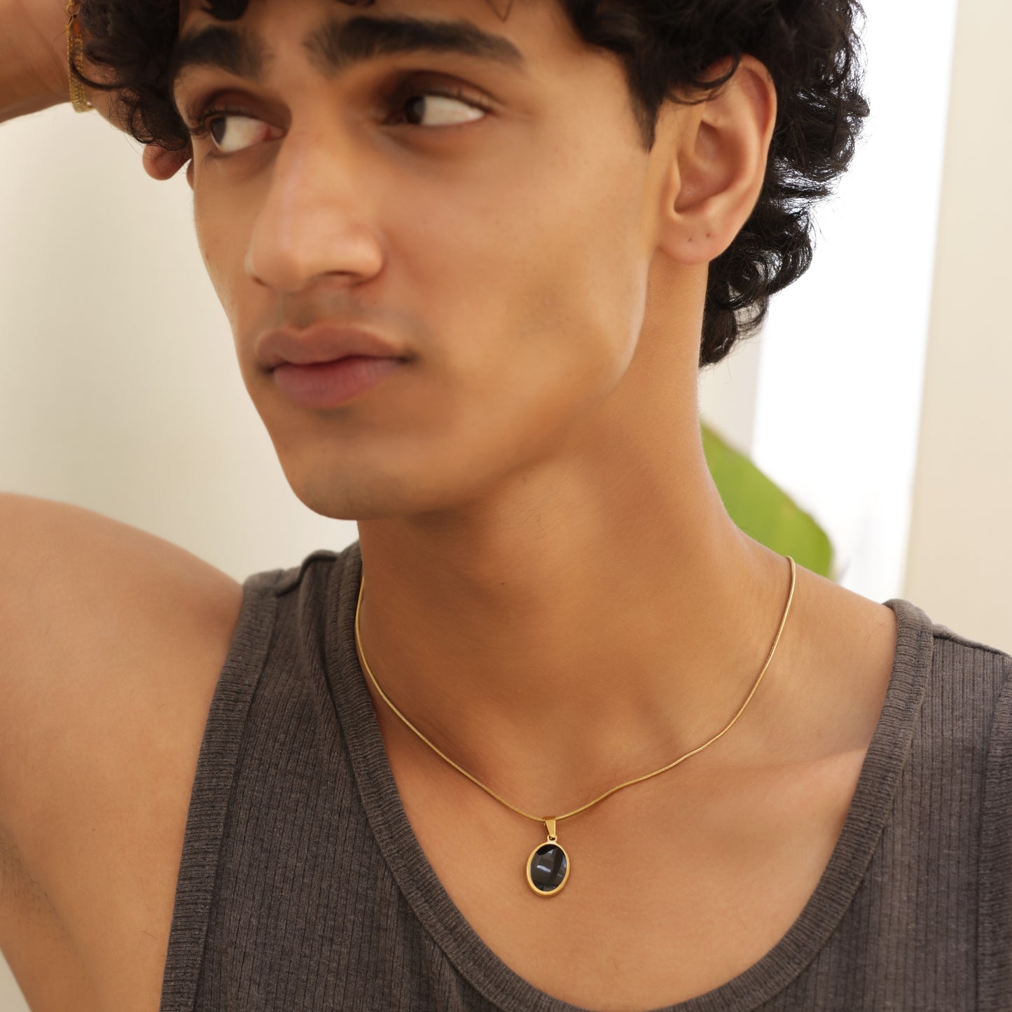 Oval Gold Pendant With Chain